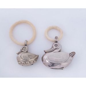 Two baby rattles, one sterling silver the other German silver…