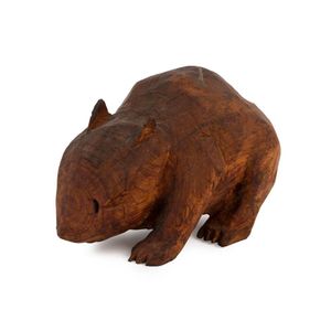A rustic style carving of a wombat, Australian, hewn from a…
