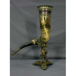Early brass mounted horn centrepiece. Cherub column on trefoil…