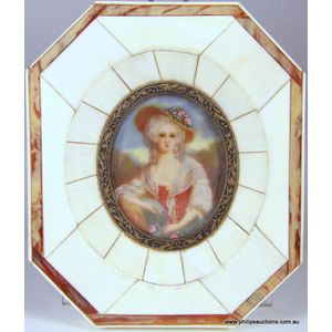 A German miniature painting in an ivory frame, the oval image…
