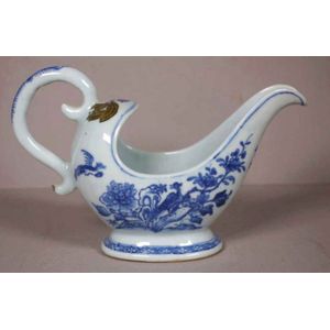 Chinese 18th C. blue and white porcelain gravy boat, with peony…