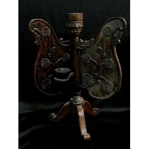 A Javanese church candle holder with breeze Protectors