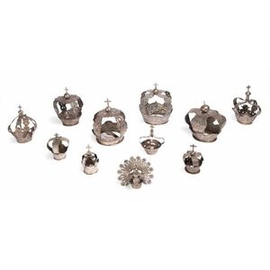 A collection of eleven silver saint coronitas, Spanish and…