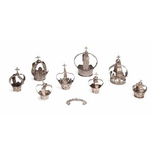 A collection of eight silver saint coronitas, Spanish and…
