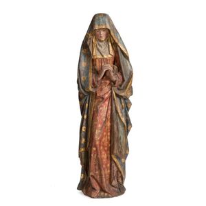 A carved polychrome wooden figure of a female saint, French,…