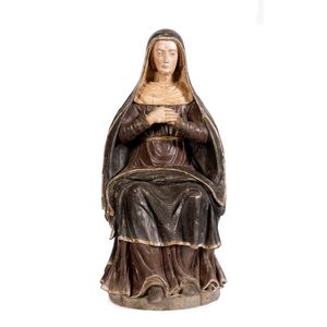 A large polychrome carved walnut seated figure of St Catherine…