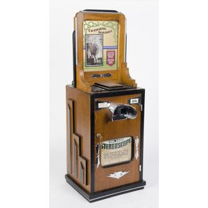 An ebonized chrome mounted oak cased penny arcade stereoscope,…