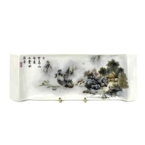 A Chinese famille rose porcelain brush rest, depicting pagoda…