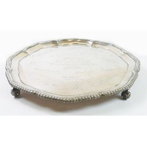 Sterling silver salver. With a gadrooned pie crust edging, four…