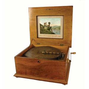 A 19th century walnut cased polyphon, along with numerous…
