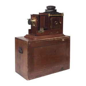 An impressive early timber cased magic lantern. Provenance:…