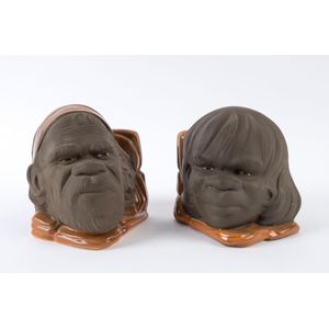 Studio Anna pair of pottery bookends with Aboriginal faces, 15…