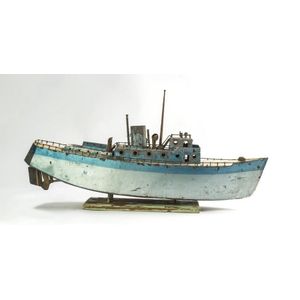 A folk art scratch built model boat, painted tin, circa 1940's,…