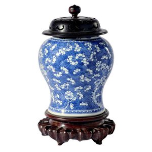 A Chinese blue and white porcelain vase, 18th century, of squat…