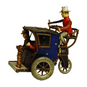 A vintage Lehman's tin toy carriage, the driver sitting behind…
