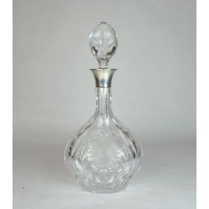 A sterling silver mount cut crystal decanter bottle mid 20th…