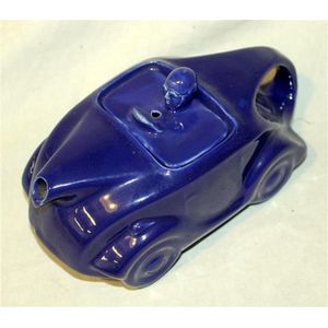 A rare James Sadler streamlined racing car teapot in deep blue,…