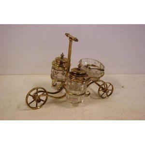 Antique novelty cruet set, in the form of a tricycle, has…