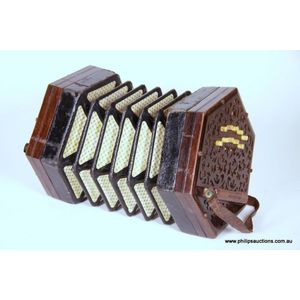 An antique Concertina in a mahogany case, early 20th century,…