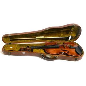 A violin in original leather case. Maker Plero Badalassifece Im…