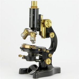 Ernst Leitz Wetzlar microscope supported by a horseshoe base &…