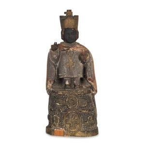 A Filipino religious statue depicting the Holy Infant of Prague,…