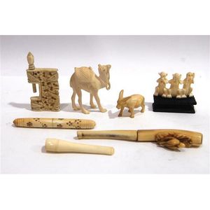 A collection of seven Ivories including a two cigarette holders,…