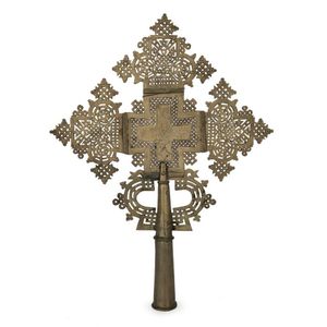 An Ethiopian Orthodox processional cross, bronze with remains…