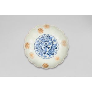A Japanese blue and white and enamel 'floral' dish,…