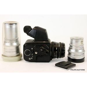 A Hasselblad V-Series 501C medium format camera and accessories,…