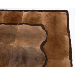 A pair of kangaroo skin rugs with original brown felt backing,…