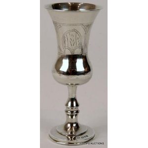 A George V sterling silver kiddush cup, 1915 Chester, with…