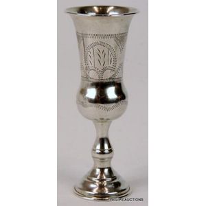 A George V sterling silver kiddush cup, 1921 London, with…