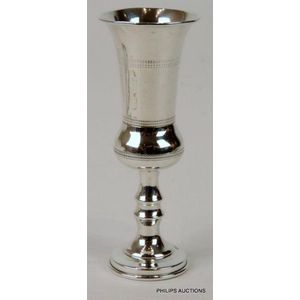 A George V sterling silver kiddush cup, 1915 Chester, with…