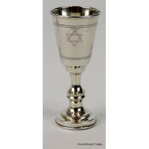 A George V sterling silver kiddush cup, 1920 London, with…