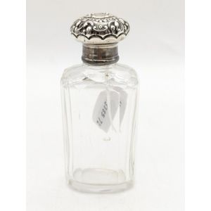 Perfume bottle.France, circa 1925. Graduated tiers with metal cap