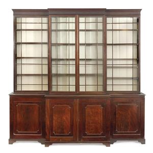 A mahogany breakfront bookcase, 19th Century having a dentil&hellip;