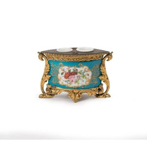 A Sevres style gilt metal mounted bleu celeste navette shaped…