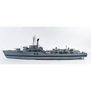 A scratch built model battleship, painted wood and metal, mid…