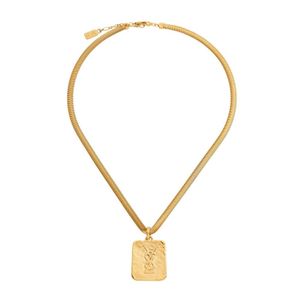 Yves Saint Laurent necklace, the monogramed medallion is of&hellip;