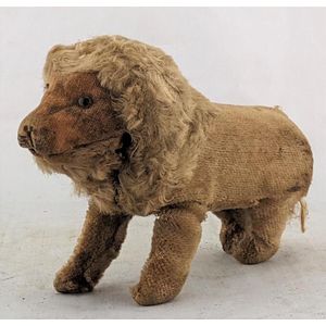 A plush clockwork lion, circus novelty, c.1950s, no key, height…