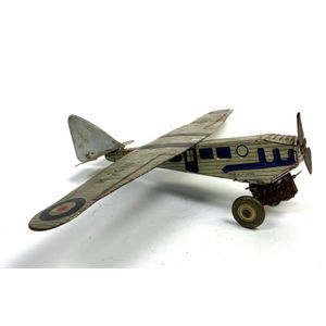 A tin plate wind up litho RAF monoplane K2010, made in Gt…