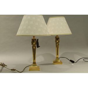 A pair of Versace gold plated table lamps with matching Versace…
