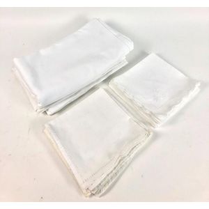 A collection of white embroidered bed linen, including a sheet…
