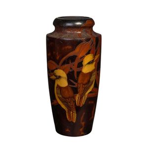 A pokerwork vase decorated with two kookaburras amongst gumnuts…