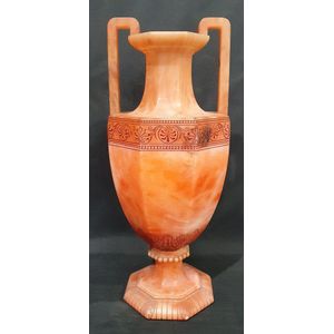 An early 20th century pink alabaster double handled urn,…