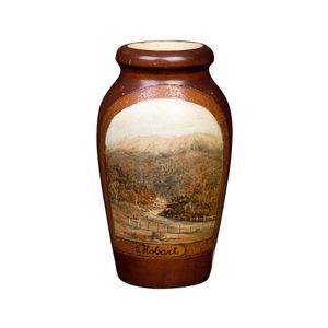 A pokerwork vase with painted scene of Mt Wellington, titled…