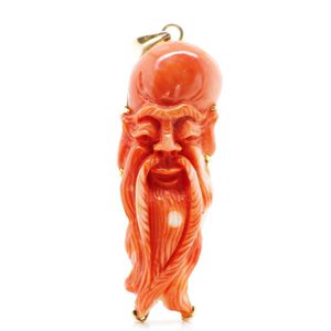 Oriental carved coral & yellow gold pendant of Shou Lao form. c.&hellip;