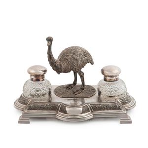 An attractive silver plated desk set adorned with emu and…