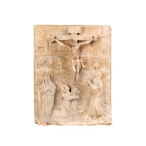 A finely carved marble panel of the crucifixion, probably…